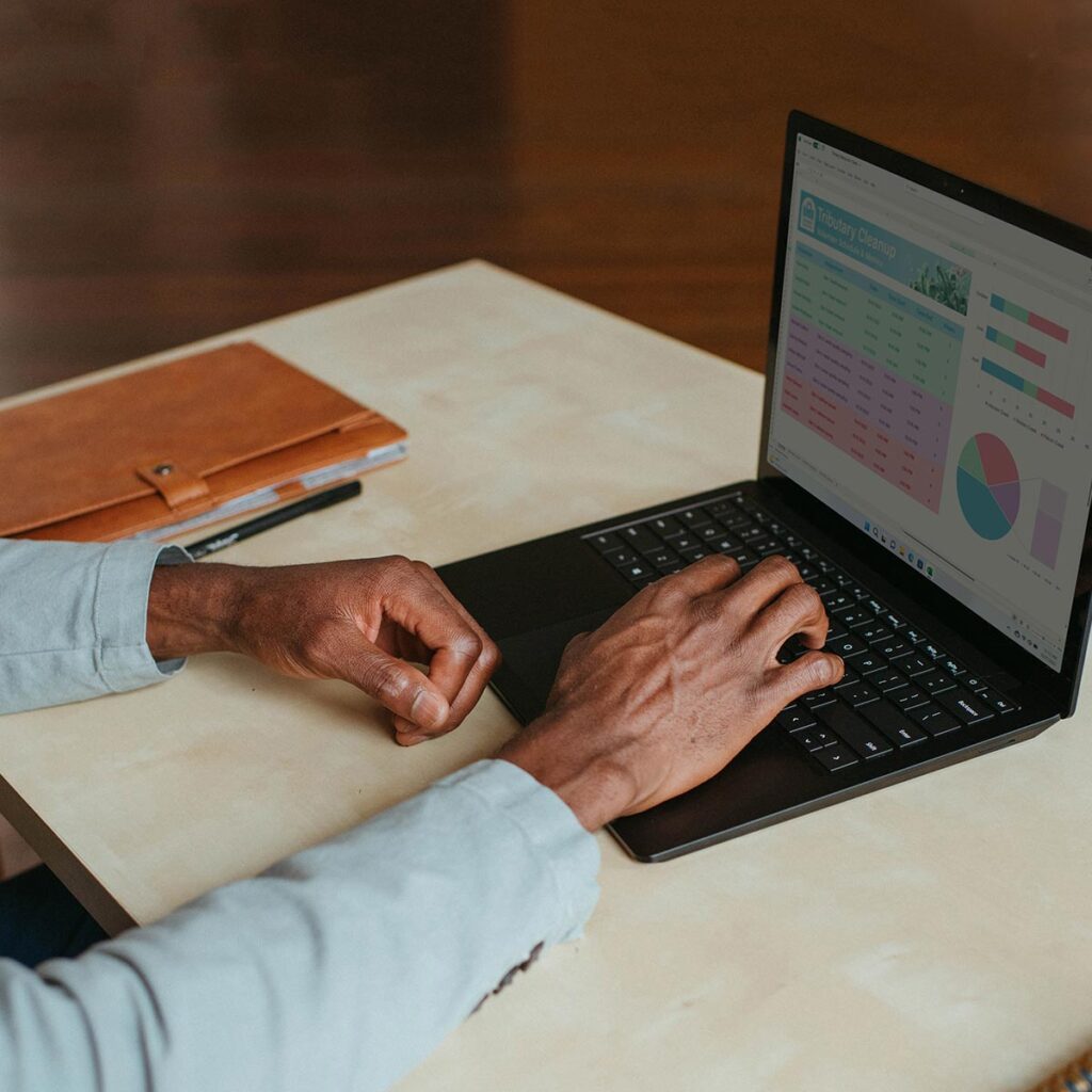 Home Product Manufacturer works on a laptop to leverage thier marketing channels and maximize their leads