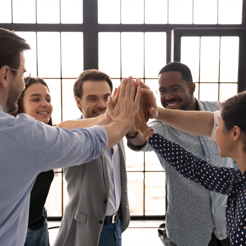 Team works and celebrates together because they are all focused on company mission.